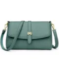 Green leather crossbody bag for women, stylish minimalist shoulder bag with gold hardware. - Green