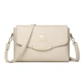 Beige synthetic leather women's crossbody bag with elegant metal clasp and adjustable shoulder strap. - Off White