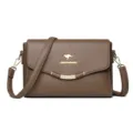 Stylish women's brown PU leather crossbody shoulder bag with metal accent and spacious design. - Elephant Gray