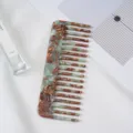 Detail shot of the acetate wide-tooth hair comb with elegant marble pattern for daily use. - 19# 4.6cm Turquoise Acetate Hair Comb