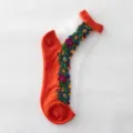 Calcetines cortos transparentes con bordado floral vintage y ribete naranja. - Talla única / Naranja