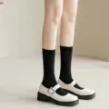 Chaussettes mi-mollet noires unies classiques pour femmes, élégantes et confortables. - Taille unique / Mi-mollet Noir