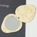 Close-up detail of the portable rotating makeup mirror with elegant acetate resin case. - Mirror Diameter 5cm / 2# Yellow