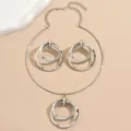 Silbernes geometrisches Mehrkreis-Collier Halskette und Ohrringe Set fuer Damen. - Silber
