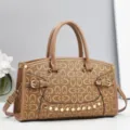 Chic brown monogram tote bag with double top handles, stylish shoulder strap and buckle. - 32.5x11x20cm / Brown