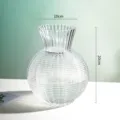 Transparent glass lantern vase with fluted neck and big belly design for home floral decor. - S