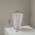 Transparent crystal glass vase with geometric textured design, ideal for living room flowers. - Medium Square Style
