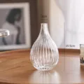 Transparent glass vase with vertical ribbed design, minimalist home decor flower container. - 320 Bell Orchid / Clear