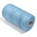Blue jute twine roll detail view for DIY crafts gift wrapping and clothing tag strings. - Sky Blue