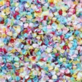 Primo piano di paillettes colorate da 4mm per nail art, dettagli brillanti per decorazioni. - 30g/Confezione / Colori Misti Galvanici