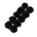 Detailed view of fluffy black mink fur pom poms arranged neatly for DIY crafting and accessories. - 3cm / Black