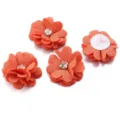 Detailed view of orange DIY fabric flower patches with sparkling rhinestone centers and backing. - 3.50cm / Orange