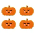 Dettaglio di quattro toppe ricamate a zucca arancione con rifinitura in glitter dorato. - Set di 4 / Zucca sorridente arancione