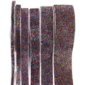 Close up of colorful glitter velvet ribbons showing sparkling textures in multiple widths. - Colorful