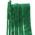 Green glitter velvet ribbon detail shot, shiny craft trim for DIY gifts and clothing accessories - Green
