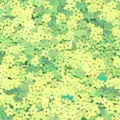 Close up shot of glossy green flower PVC sequins, ideal for DIY nail art and crafts. - 30g/Pack / Golden Luster Green