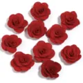 Dettaglio di rose glitterate rosse, perfette per decorazioni fai-da-te e accessori. - Rosso