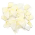 Closeup detail of light yellow polka dot mesh double layer hair bows for DIY craft accessories. - 6cm (Ribbon Width 2.5cm) / Beige