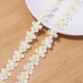 Detailed view of white polyester water-soluble embroidered daisy lace trim, fine texture and craft. - Daisy Lace Trim / 1.5cm Diameter (3 Yards Approx. 160 Pcs) / Yellow