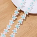Polyester white blue daisy flower lace trim detail shot, perfect for DIY craft decoration. - Diameter 1.5cm (3 Yards Approx. 160 Pcs) / Blue