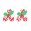 Close-up detail of Christmas candy cane embroidery patches with vibrant red and green holly. - Christmas Candy Cane