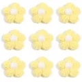 Close-up details of handmade yellow crochet yarn flowers, perfect for DIY craft accessories. - 10 Pieces / Yellow Petals (White Stamen)