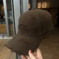 Casquette de baseball marron effet delavé avec texte brodé, style streetwear vintage. - Café