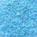 Close-up detail of light blue PVC four-pointed star sequins for nail art and crafts DIY. - 30g/Pack / Plated Colorful Blue Four-Pointed Stars