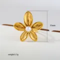Close-up detail of the gold flower pearl ring showing the 31mm size and 5.7g weight design. - Gold