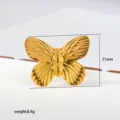 Gold butterfly ring detail view, adjustable stainless steel geometric finger jewelry feature. - Gold