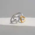 Detailansicht eines trendigen Doppelherz-Offenen Rings im schicken Gold-Silber-Zwei-Ton-Design. - Doppelherz Stil (698)