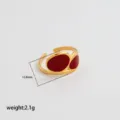 Stainless steel open adjustable ring with wine red enamel, minimalist luxury jewelry detail view. - Style 268