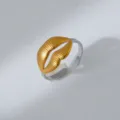 Detail view of stylish two-tone stainless steel lip ring with gold lips and silver adjustable band. - 3D Lip Style