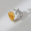 Two-tone stainless steel open ring featuring a gold shell and silver starfish ocean design. - Ocean Seashell Starfish Style