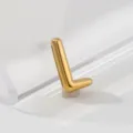 Gold stainless steel letter L pendant detail, polished finish for custom jewelry design. - L