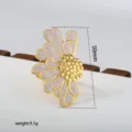 Exquisite stainless steel flower ring featuring elegant white drip-oil petals and gold finish. - Gold