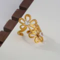 Exquisite stainless steel cubic zirconia open ring featuring elegant double flower design in gold. - Double Flower Style / Gold