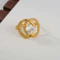 Close-up view of the 18k gold plated stainless steel interlocking ring featuring a square cubic zirconia. - Interlocking Double Ring Square Stone Style / Gold