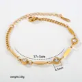 Edelstahl Herz Armband Detailaufnahme mit funkelndem Zirkonia Stein und eleganter goldener Kette. - Herz Transparente Zirkonia (C-1-103)