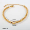 Goldene Edelstahl Perlen Armband Detailansicht mit Zirkon Herz Anhänger und Verlängerungskette. - Perle Herz Zirkonia (C-1-106)