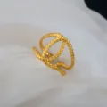 Adjustable gold stainless steel twisted ring, retro interlocking open band for women and men. - Intertwined Twisted Rope Ring / Gold