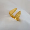 Adjustable gold stainless steel ring with feather wing design for men and women couple jewelry. - Feather Embossed Open Ring / Gold