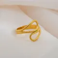 Adjustable stainless steel ring with retro textured open design for daily fashion wear. - Braided Granular Textured Ring / Gold