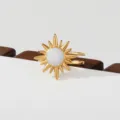 Gold stainless steel sunburst ring with white inlay, stylish stackable fashion jewelry item. - Sunburst Style(255)
