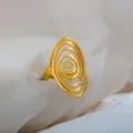 Adjustable stainless steel ring with a retro oval spiral design and sleek gold finish. - Oval Spiral Lines Ring / Gold