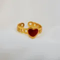 Adjustable stainless steel heart ring in gold finish with red enamel link band design. - Red Heart Chain Band Ring / Gold