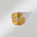 Two-tone stainless steel leaf piercing jewelry, stylish gold and silver ring accessory. - Hollow Leaf Style