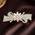 Rhinestone spring hair clip with pink flower and alloy bow design for women elegant hair. - Flower Design / Nude