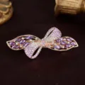 Alloy bow hair clip featuring sparkling purple rhinestones and pink crystals, elegant spring barrette. - Ribbon Purple