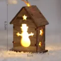 Wooden Christmas tree house pendant with warm LED light, cute snowman hollow design, 6.5x5cm. - Natural Snowman